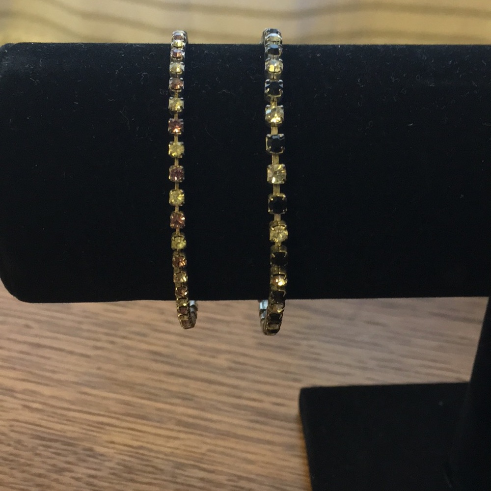 Costume jewelry tennis bracelets.